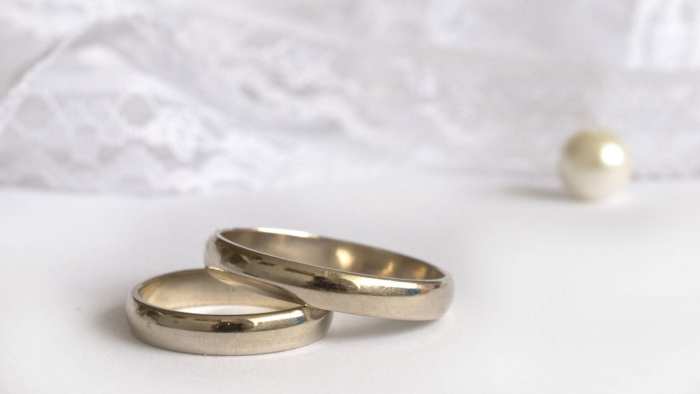 Blurred Wedding Rings Stock Photos and Images - 123RF